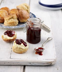 Strawberry Preserve served on scones with cream.