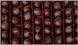 Liqueur Cherries On Stalk Dark boxed in a tray.